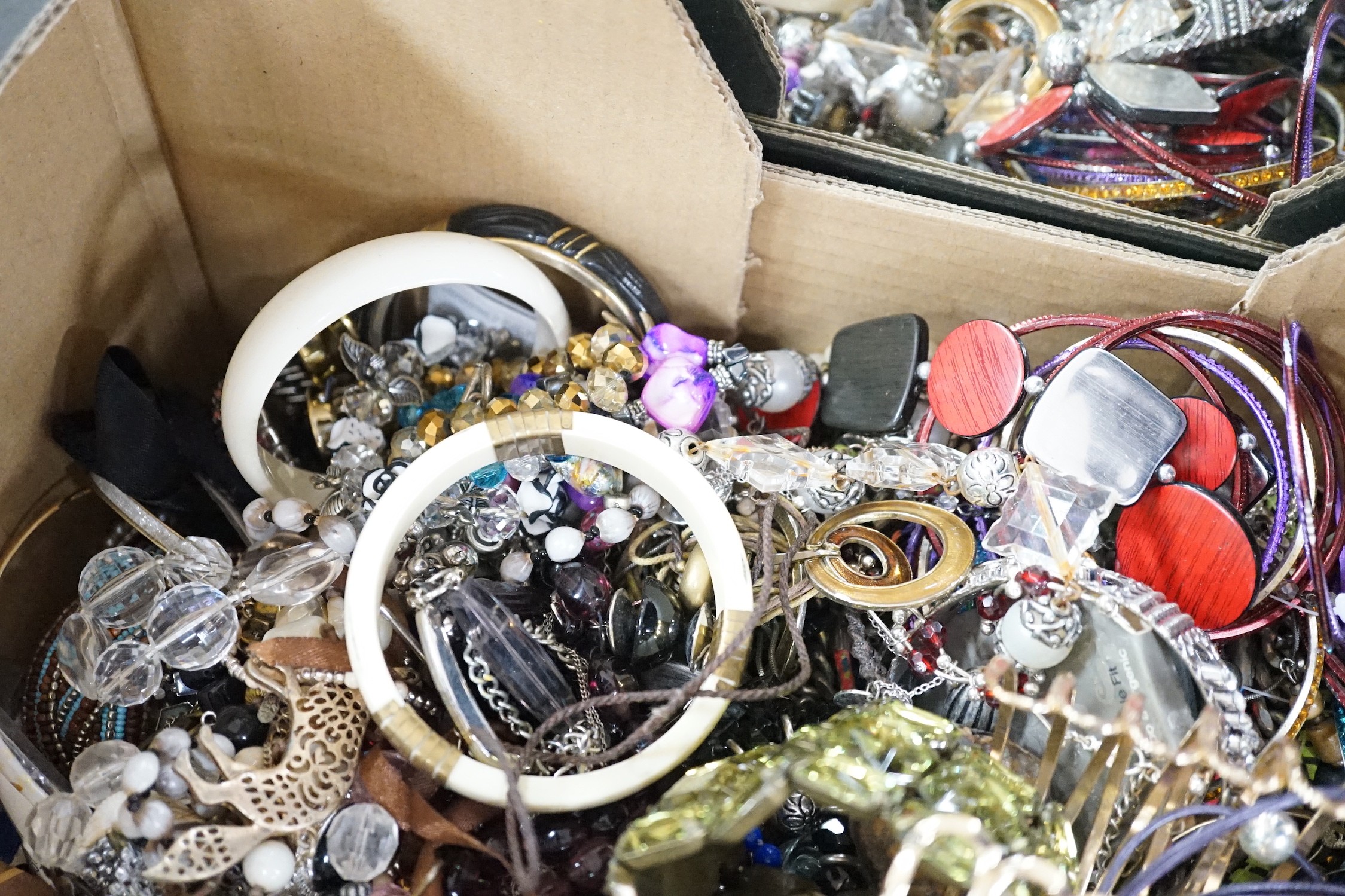 A large quantity of assorted bangles and other costume jewellery.